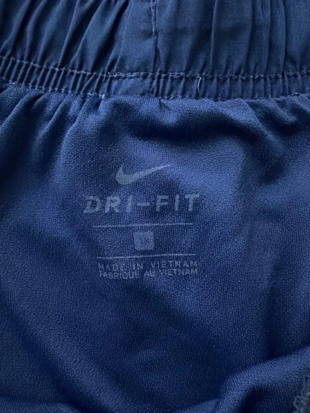 Nike Women's Dark Navy Athletic Shorts with White Swoosh